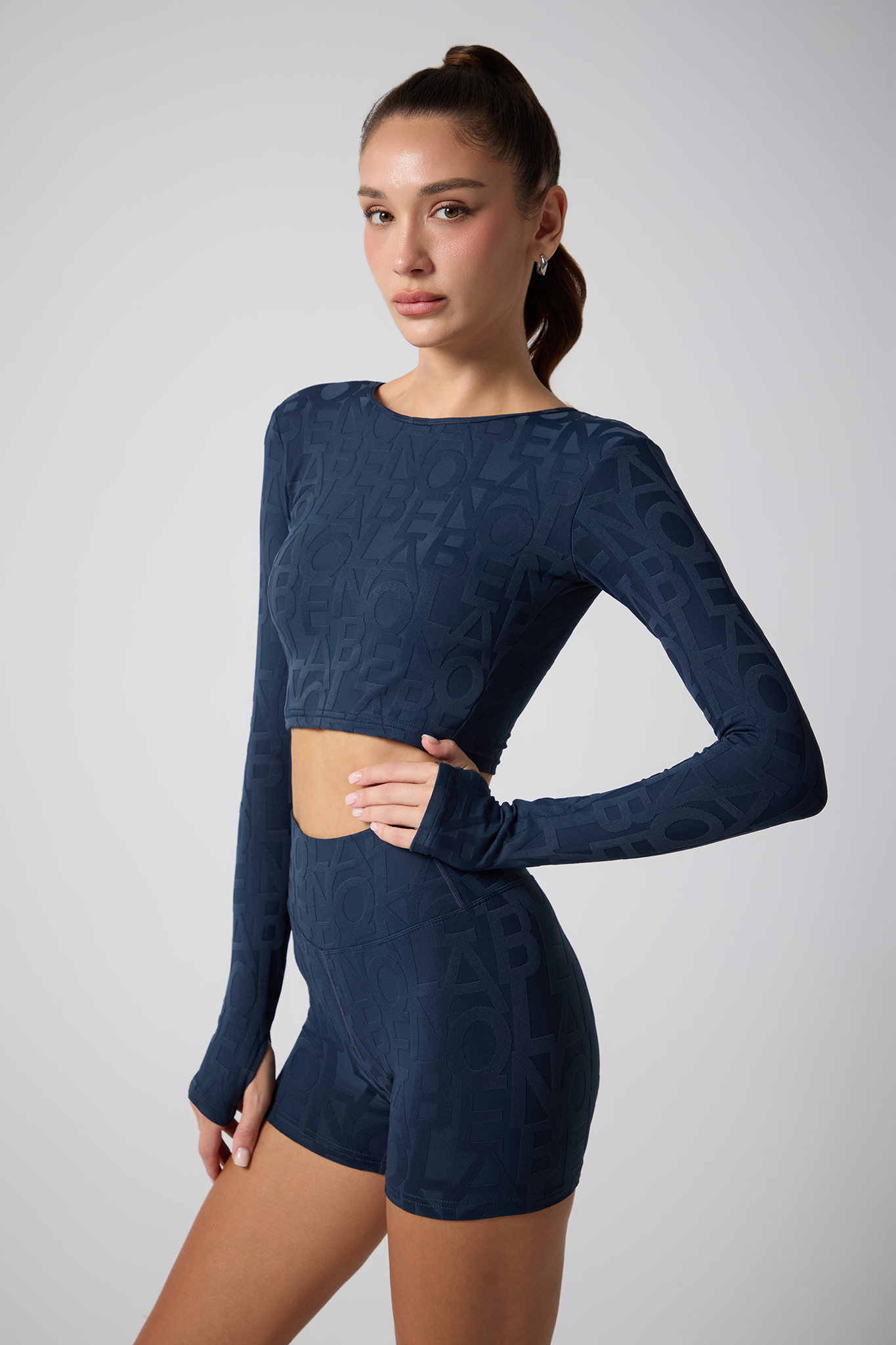 Olaben Deese Fleur 3D sports bra in deep navy, embossed sculpting fabric