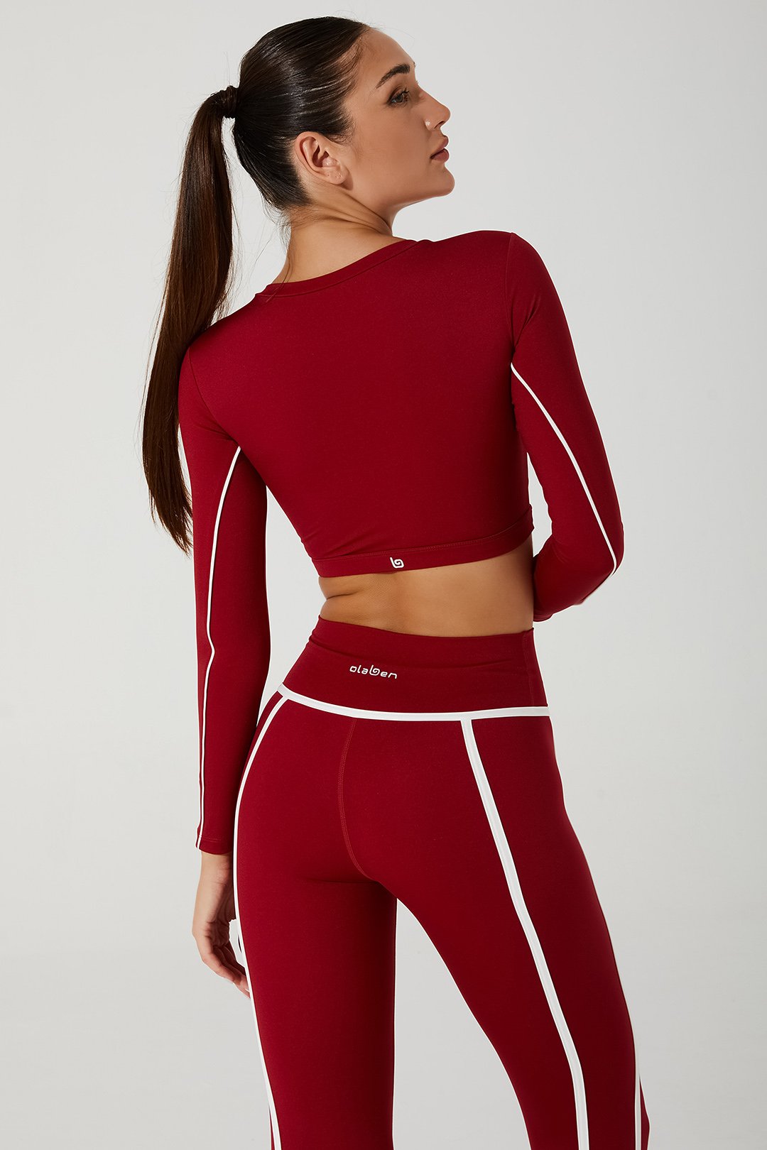 Vibrant magenta red Clio long sleeve women's bra, perfect for a stylish and comfortable look.
