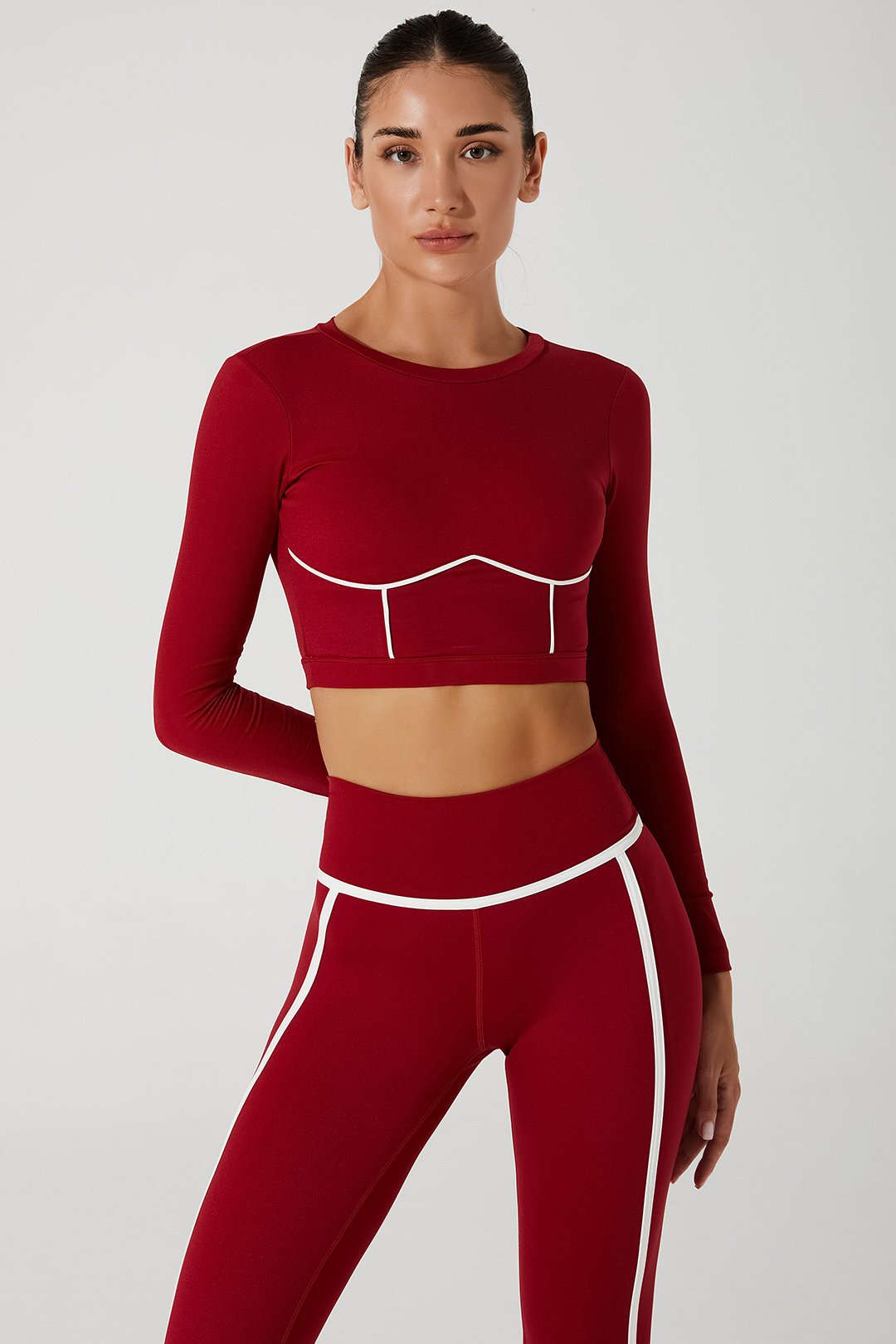 Stylish magenta red Clio long sleeve women's bra, perfect for a vibrant and confident look.