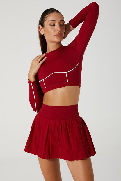 Vibrant magenta red Clio long sleeve women's bra, perfect for a stylish and comfortable look.