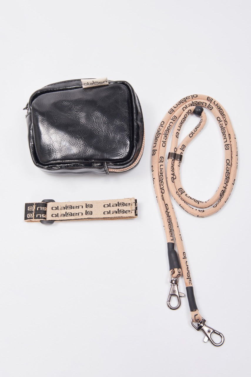 Stylish black crossbody bag for everyday use, perfect accessory to elevate your outfit.