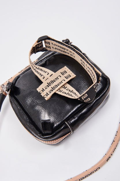 Stylish black crossbody bag for women, perfect for everyday use and versatile fashion statement.