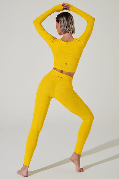 Vibrant gamboge yellow 3D leggings for women, perfect for a stylish and comfortable look.