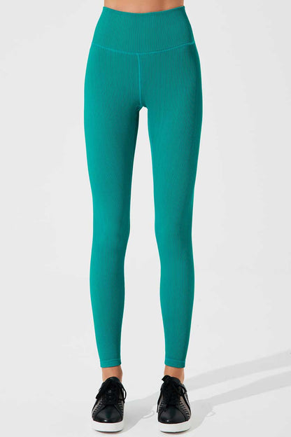Stylish high-waist pine green leggings for women, perfect for a trendy and comfortable look.
