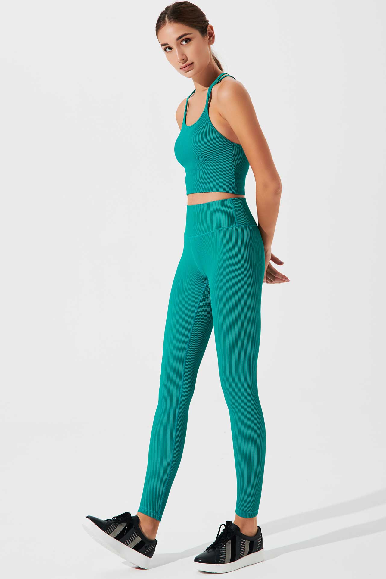 Stylish pine green high-waist leggings for women, perfect for a trendy and comfortable look.