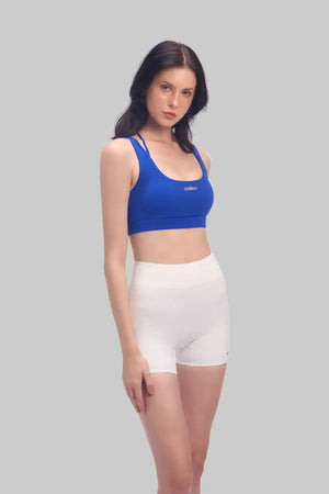 Side view of Olaben Evo Sculpt Bra in Klein Blue — Evo fabric profile, studio shot