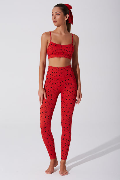 Vibrant red polka dot women's bra with beetle design, perfect for a stylish look.