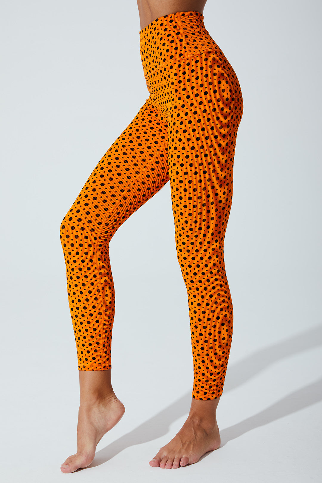Vibrant orange polka dot leggings for women, featuring a playful beetle design - OW-0023-WLG-OR.