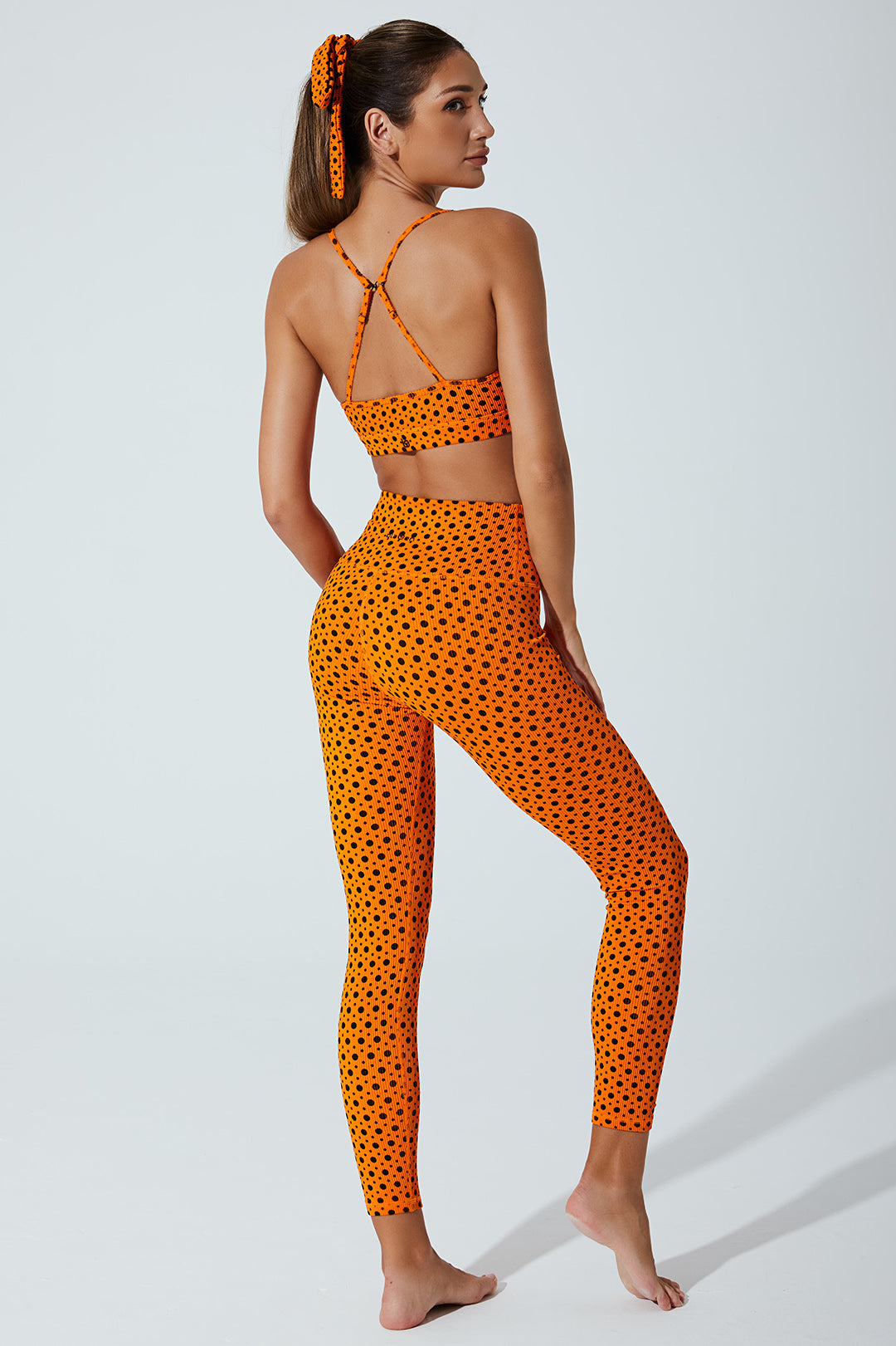 Vibrant orange polka dot leggings for women with a playful beetle design - OW-0023-WLG-OR.