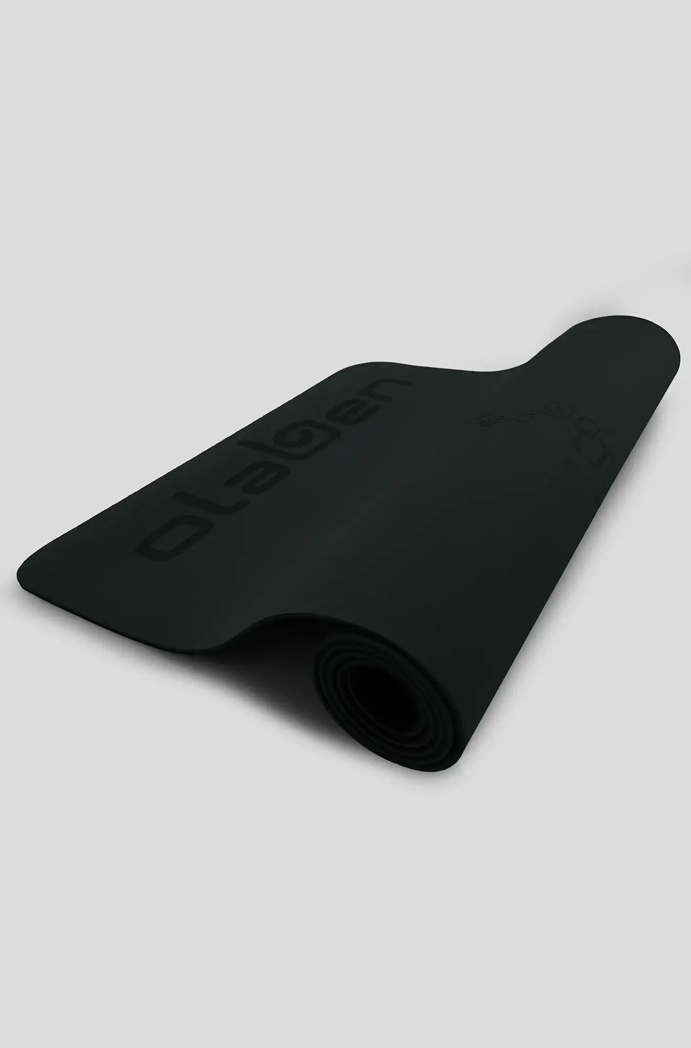 Black rolled yoga mat with embossed brand logo, ideal for fitness and home workouts