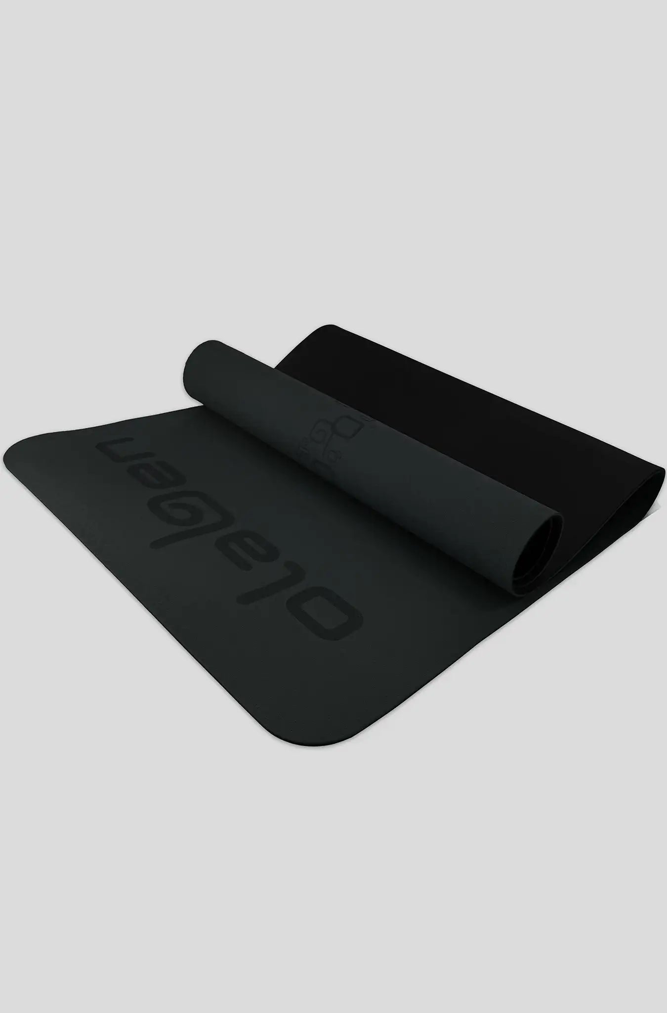 Black yoga mat with Olaben logo, partially rolled, for fitness and yoga workouts