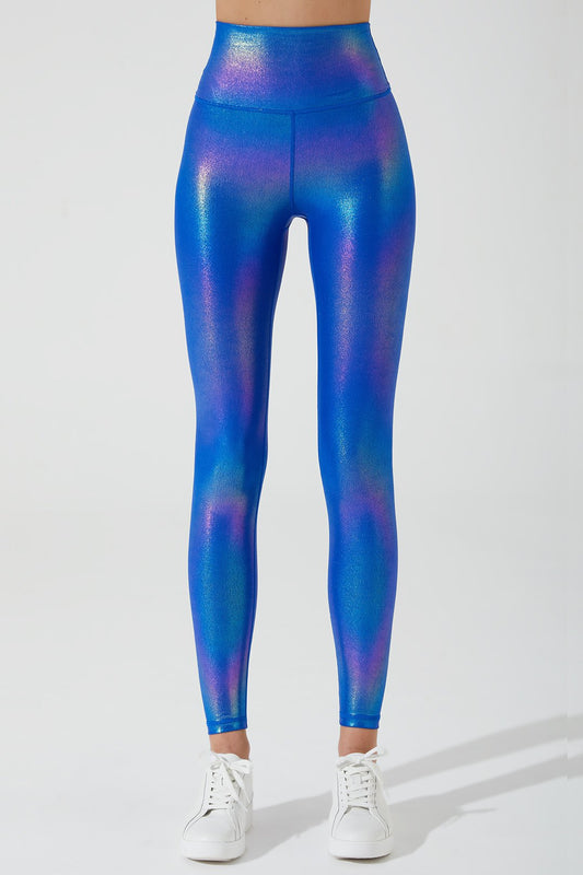 Vibrant blue magnetic leggings for women, perfect for a stylish and comfortable workout.