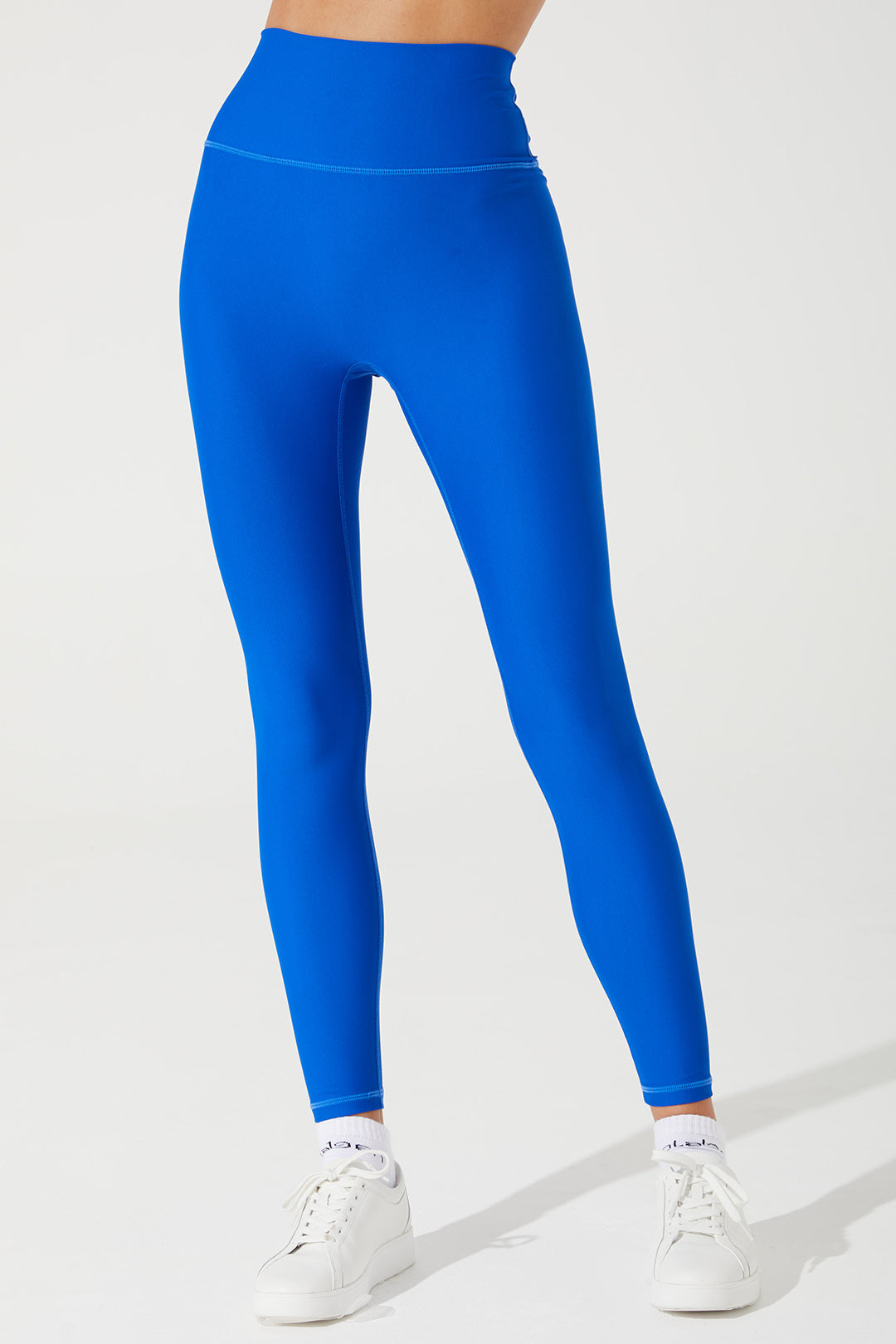 Stylish Atlantis Blue women's leggings, perfect for any occasion, available in size 2.