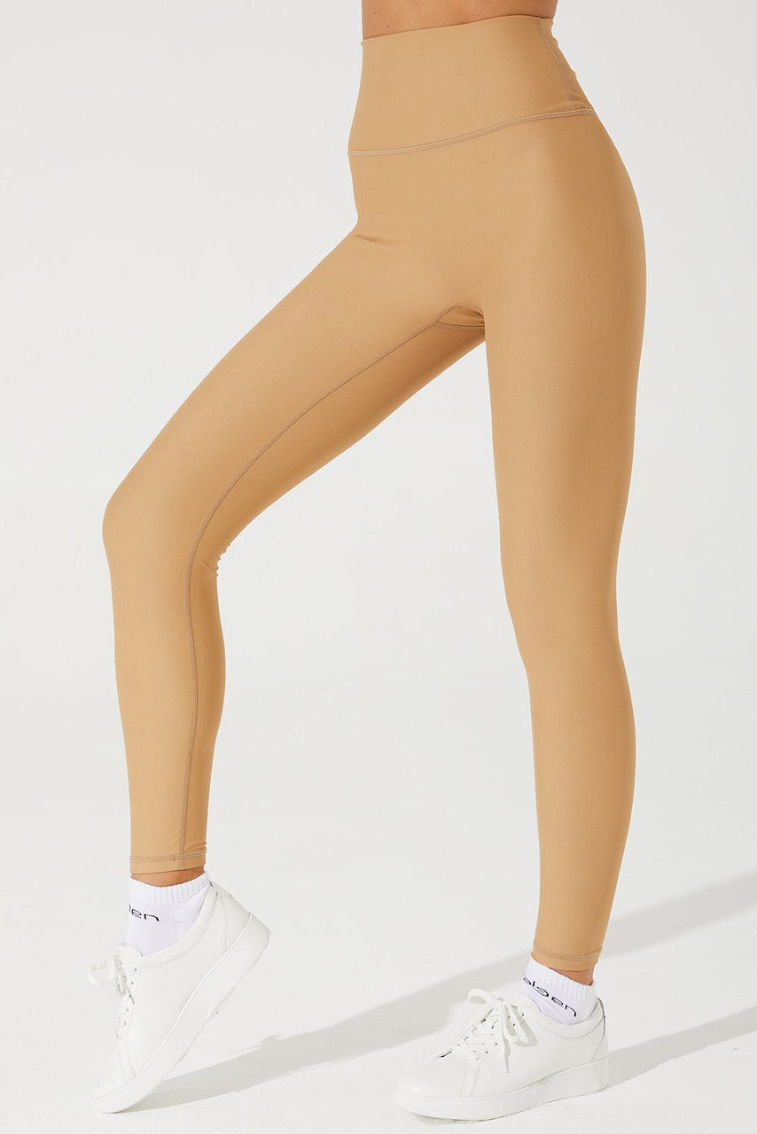 Cappuccino beige women's leggings, perfect for a stylish and comfortable look.
