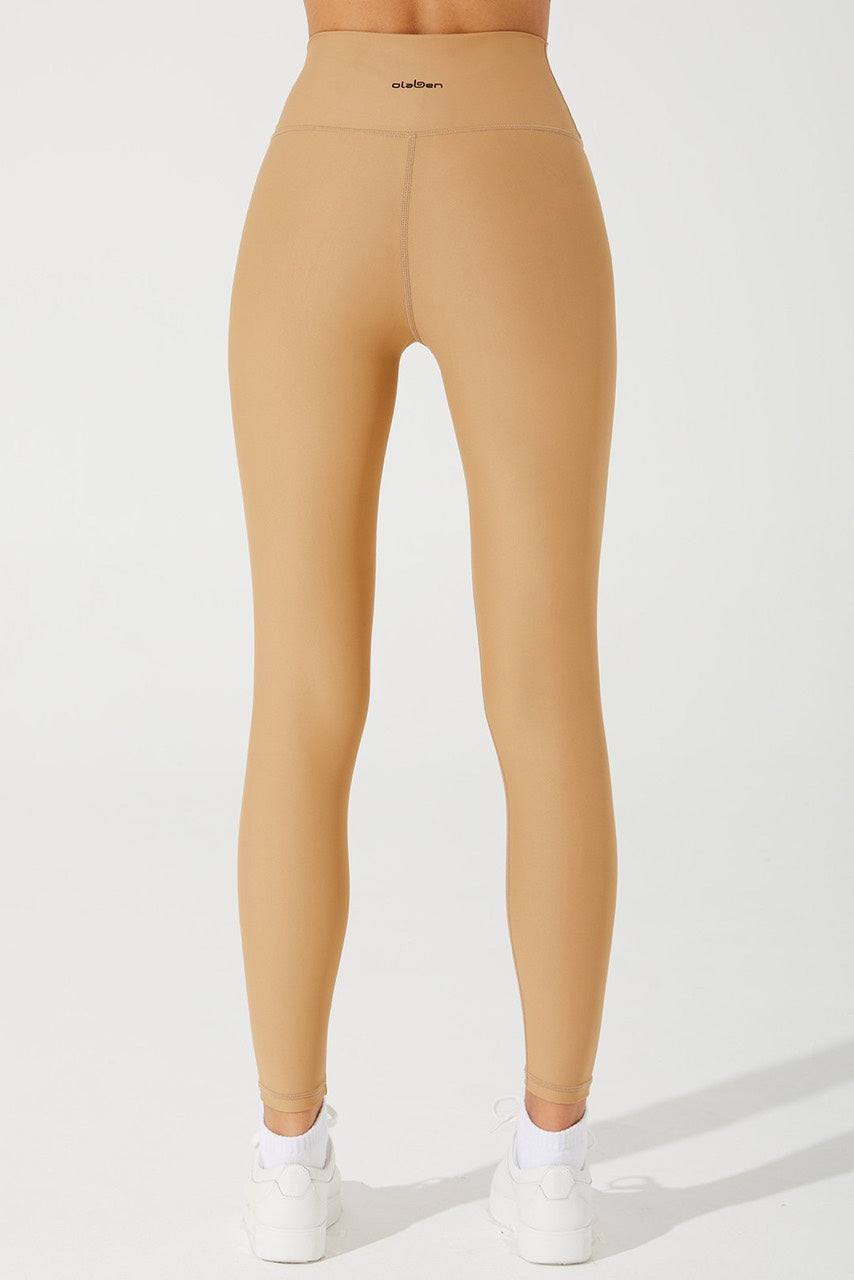 Stylish cappuccino beige women's leggings, perfect for a trendy and comfortable look.
