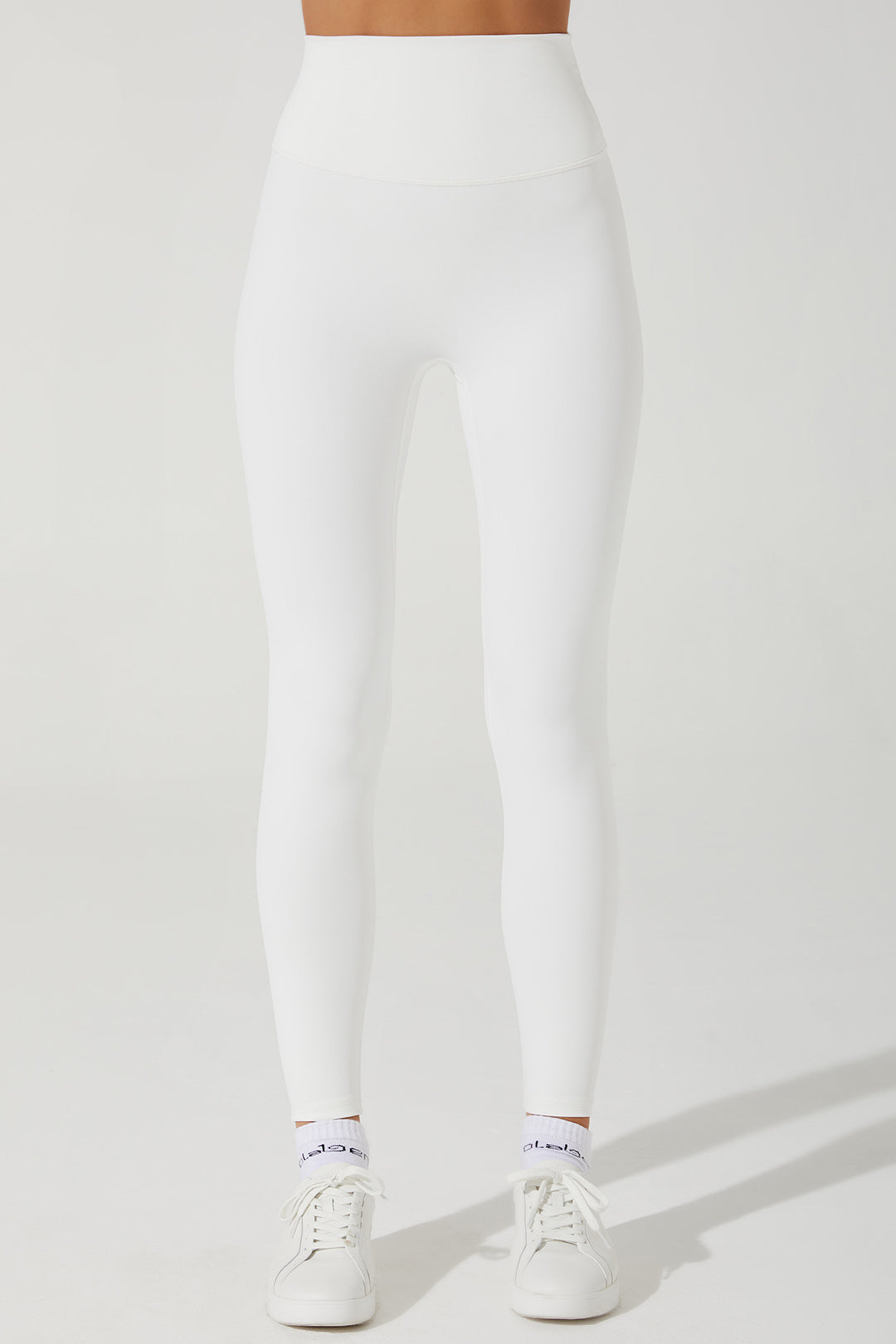 White women's leggings with a stylish design - perfect for any casual or active outfit.