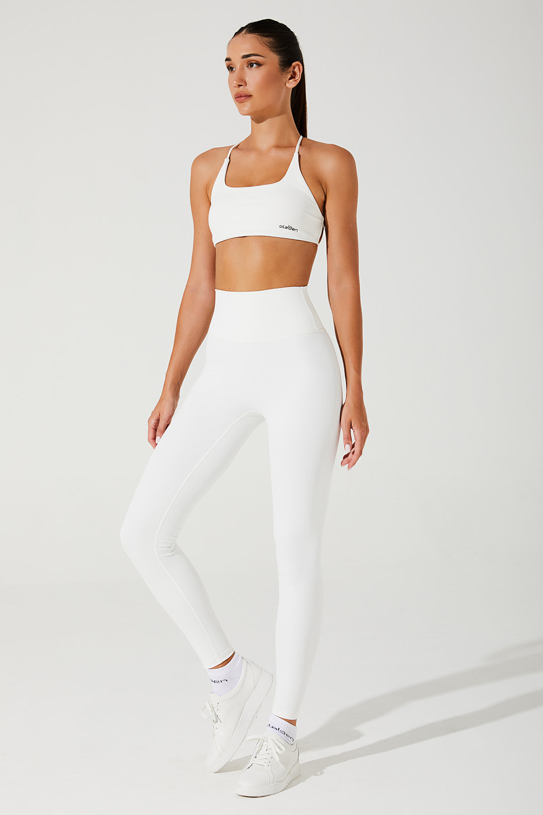 White women's leggings with a stylish design, perfect for any casual or athletic outfit.