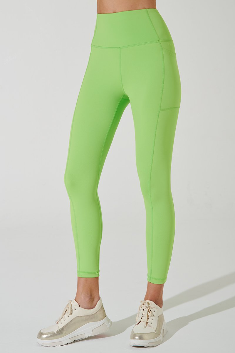 Fluorescent green women's leggings with a pocket, perfect for Julian's active lifestyle.
