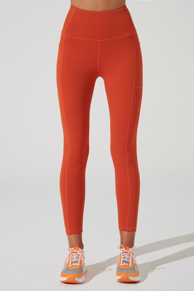 Stylish carmine orange women's leggings in medium size by Julian Pocket - OW-0112-WLG-OR.