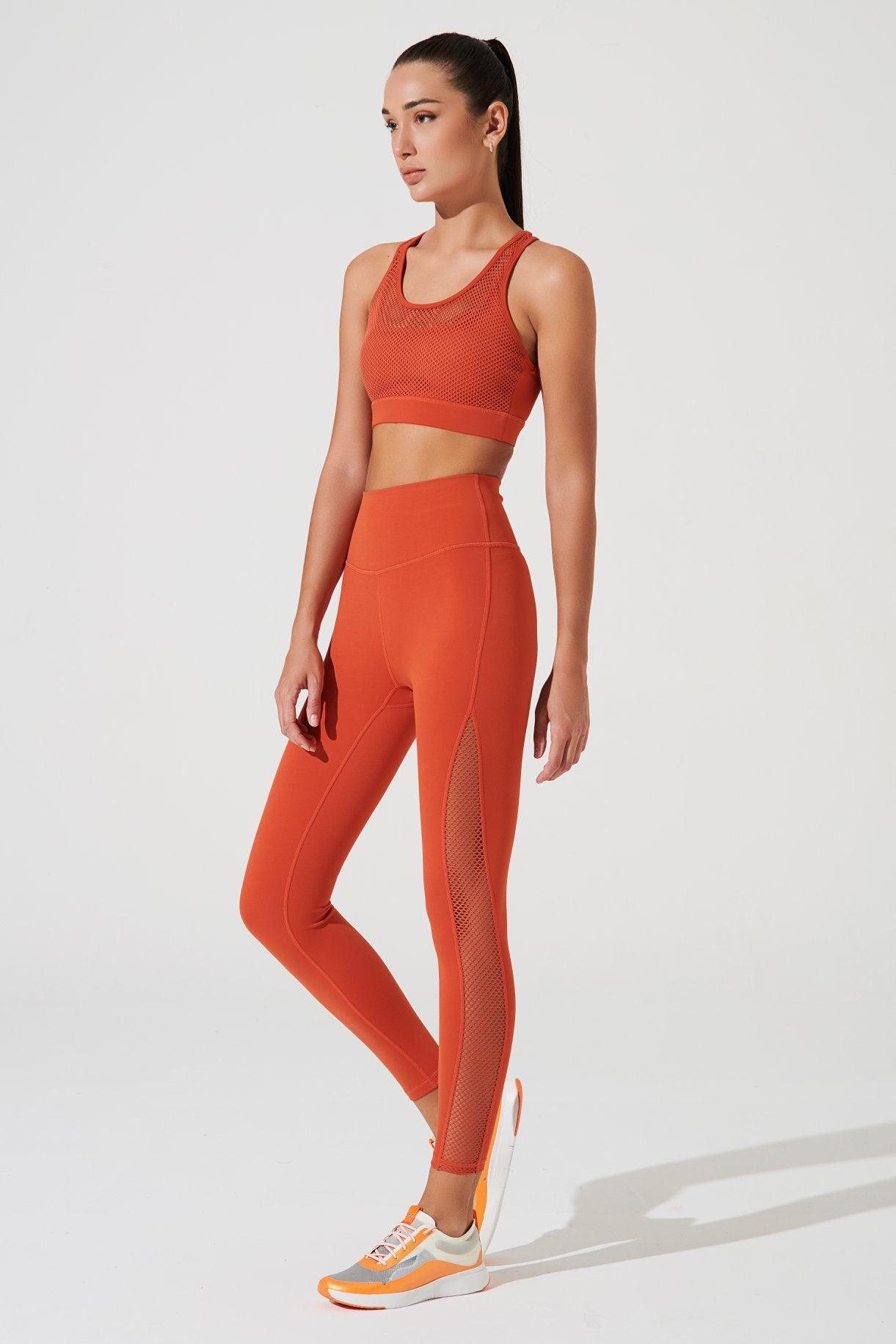 Stylish women's carmine orange bra in medium size, perfect for a fashionable look.