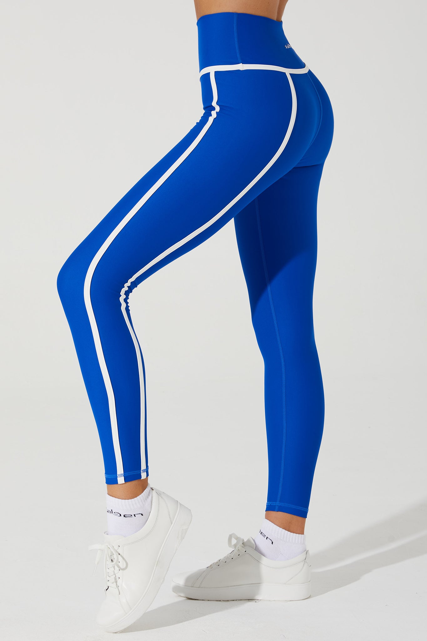 Stylish Atlantis Blue women's leggings with a ludic design, perfect for active and trendy individuals.