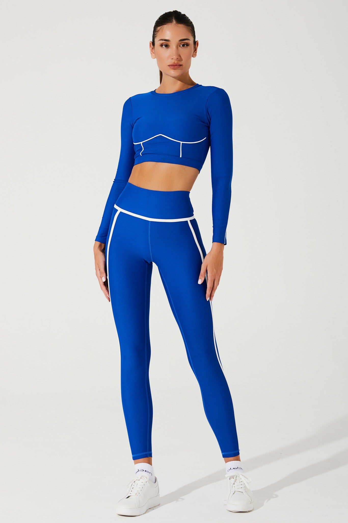 Stylish Atlantis Blue women's leggings with a ludic design, perfect for active wear.