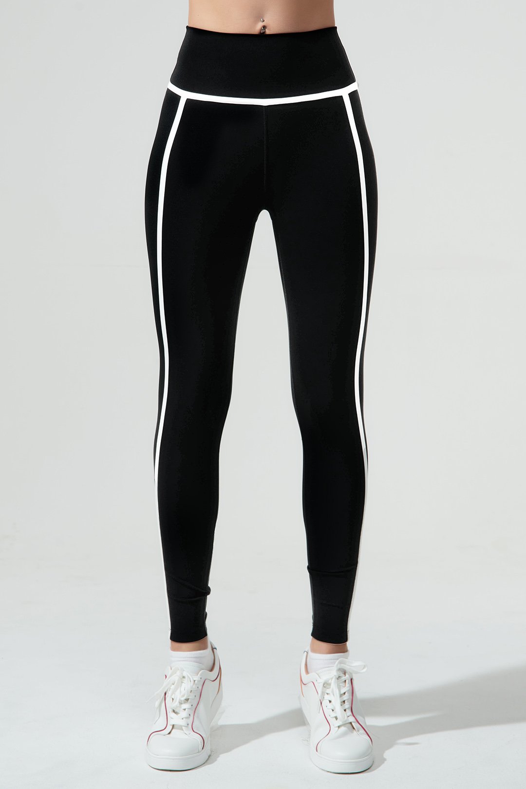 Stylish black women's leggings with a jet black shade, perfect for a trendy look.