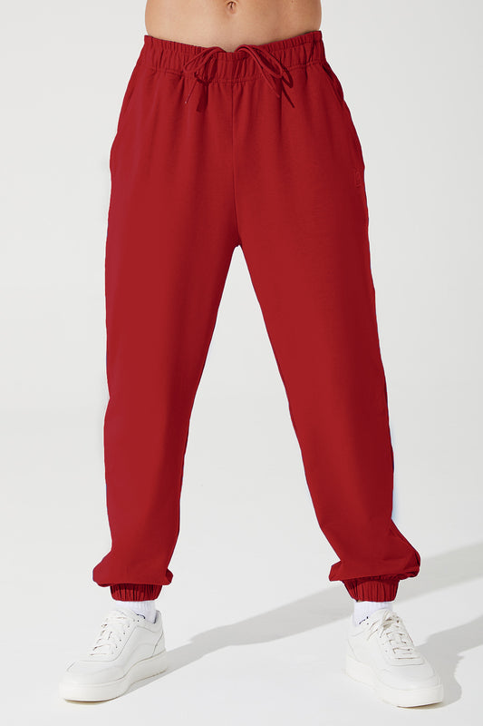 Vibrant magenta red sweatpants for men, perfect for a comfortable and stylish look.