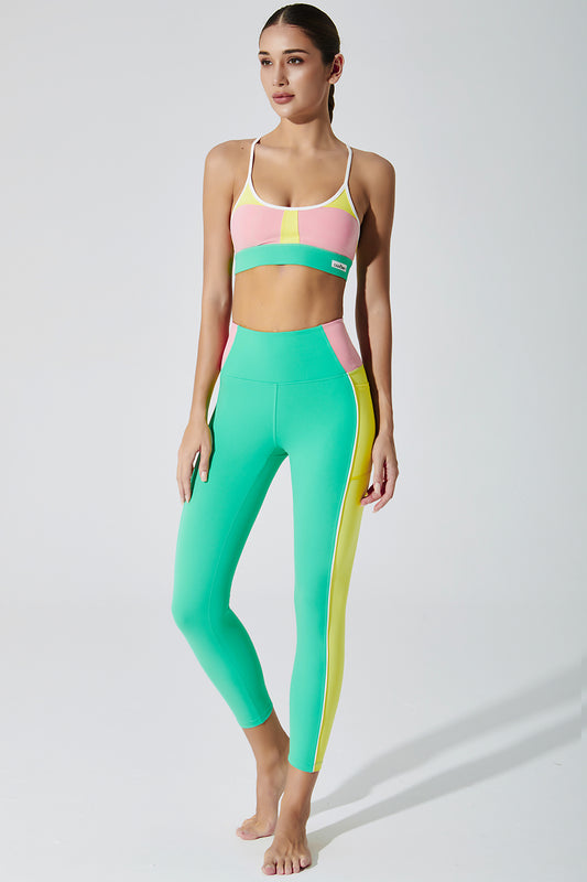 Pastel green women's leggings with colorblock design, perfect for a trendy and comfortable look.