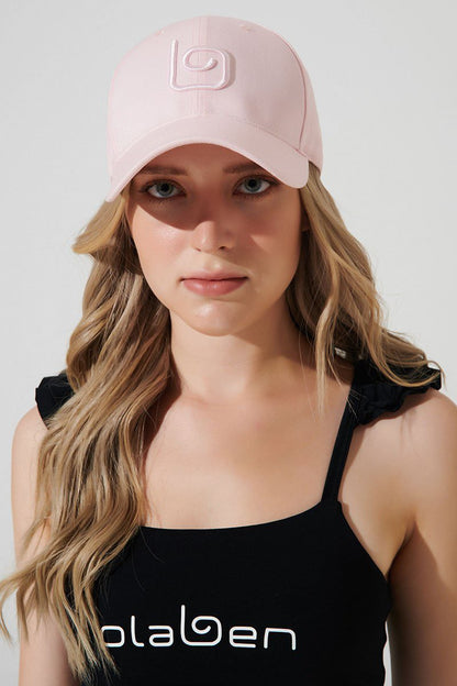 Stylish pink baseball cap with the brand name 'olaben' for a fashionable headwear choice.
