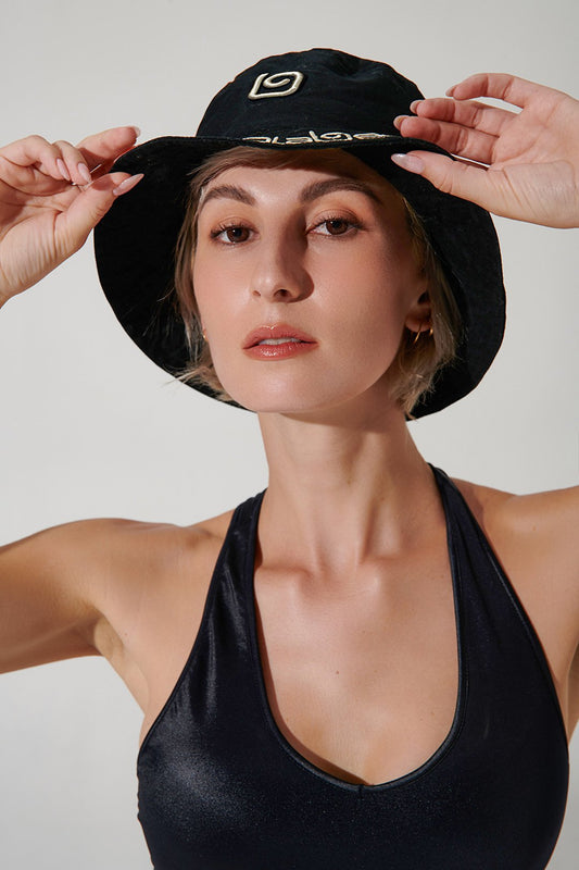 Black bucket hat headwear for men and women - stylish and versatile fashion accessory.