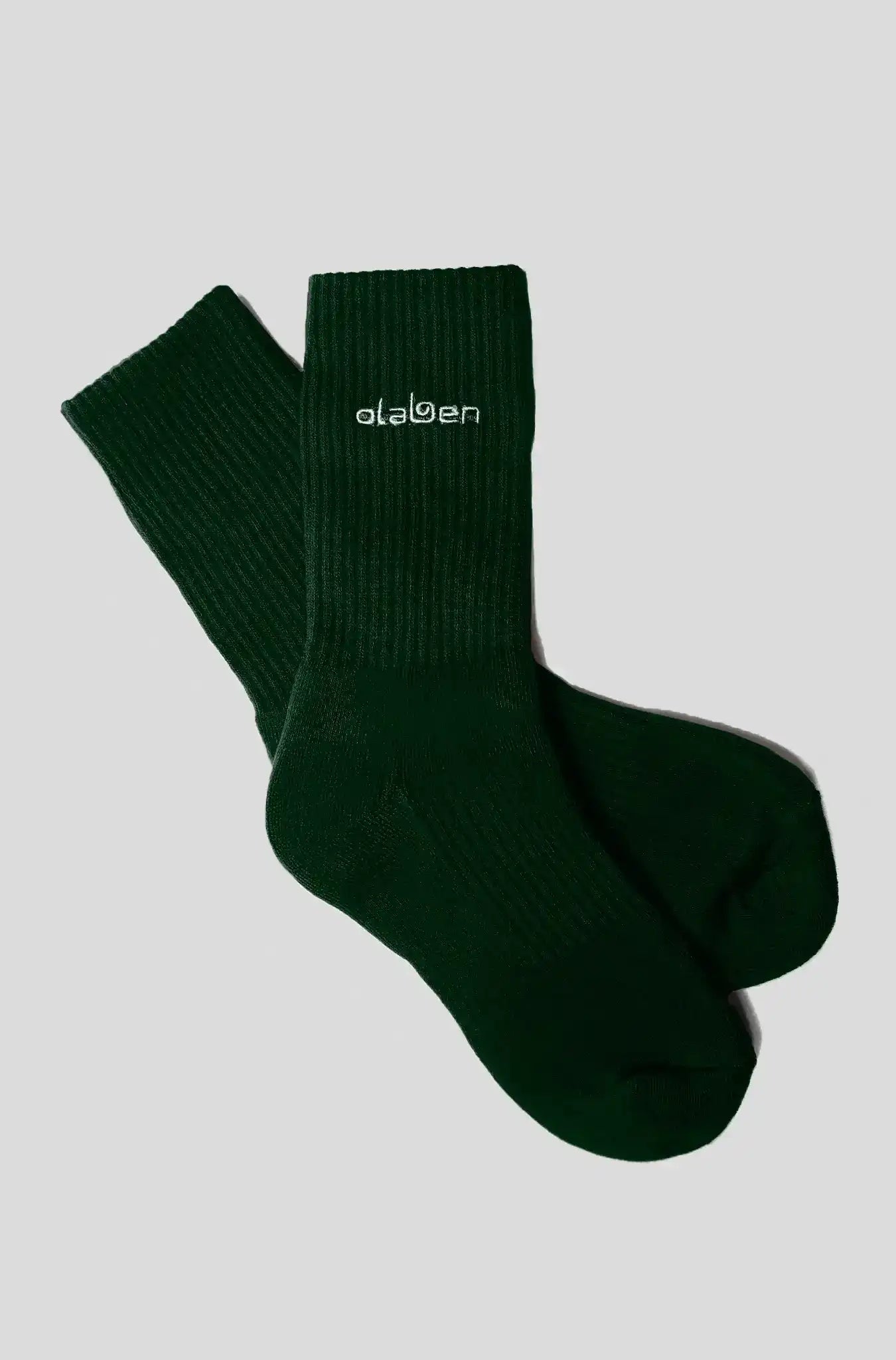 Dark green ribbed socks with Olaben logo, ideal for yoga and fitness activities