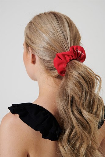 Amaranth red scrunchie headwear, perfect for adding a pop of color to your outfit.