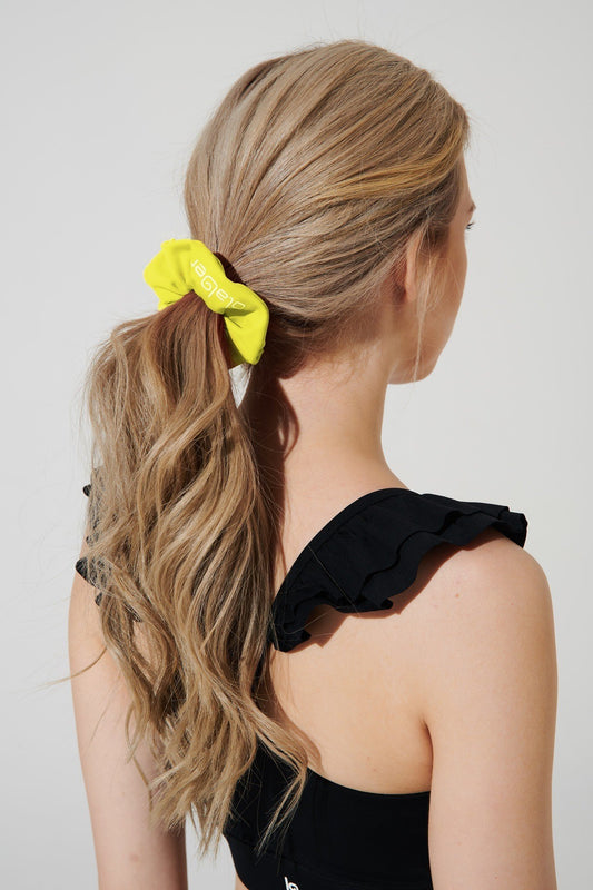 Vibrant wild rice yellow scrunchie headwear, perfect for adding a pop of color to your style.