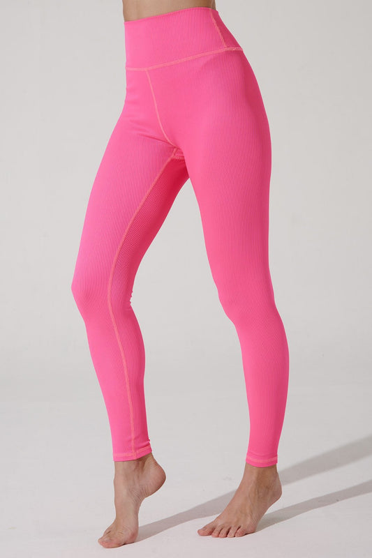 Hot pink high-waist leggings for women, perfect for a stylish and vibrant workout ensemble.