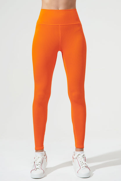Vibrant tangerine orange high-waist leggings for women, perfect for a stylish workout or casual wear.