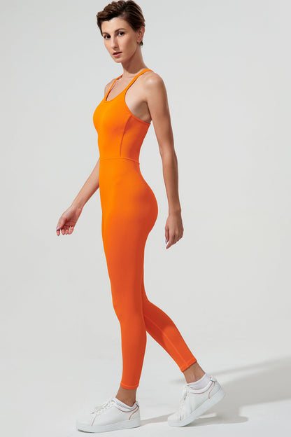 Stylish tangerine orange jumpsuit for women, perfect for a suave and pulpy fashion statement.