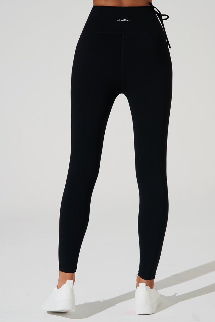 Stylish black women's leggings with a flattering fit and a touch of angelic charm.