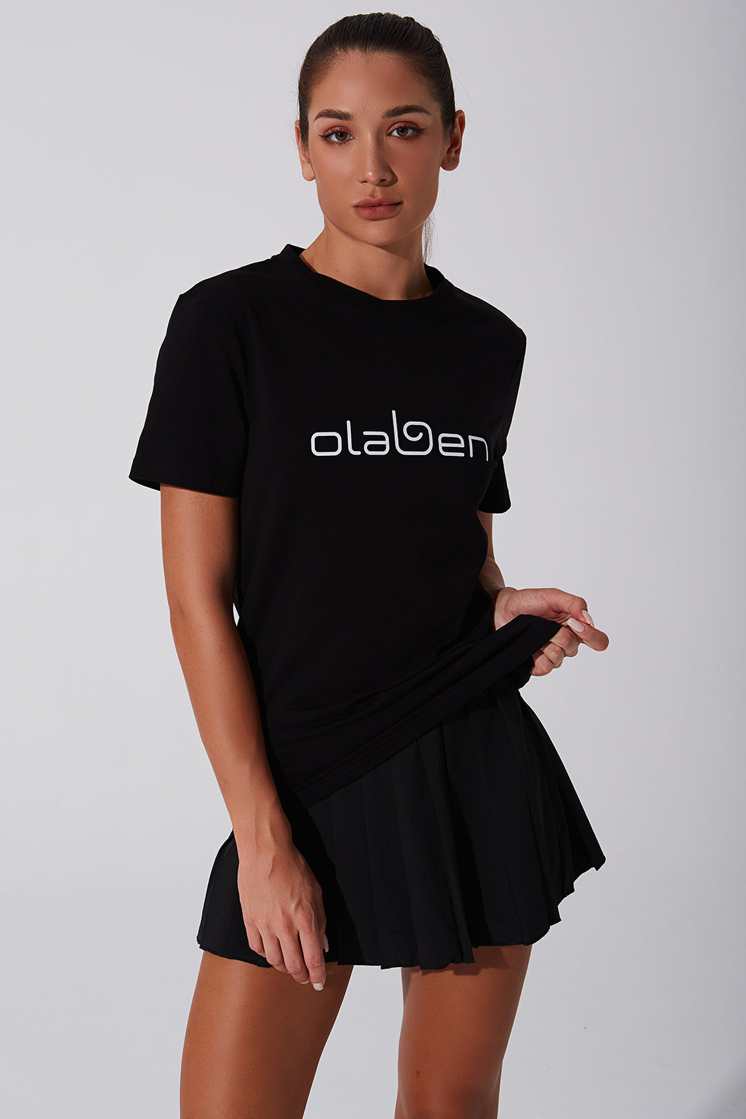 Unisex black short sleeve tee for women - versatile and stylish fashion choice.
