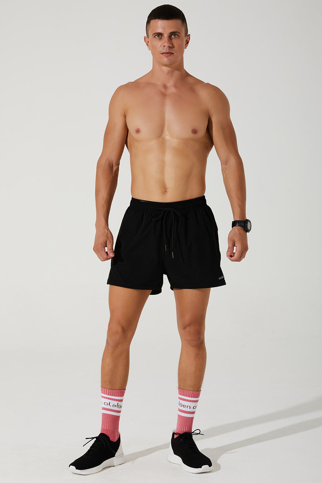 Black running shorts for men, perfect for adapting to any workout. OW-0015-MSH-BK.