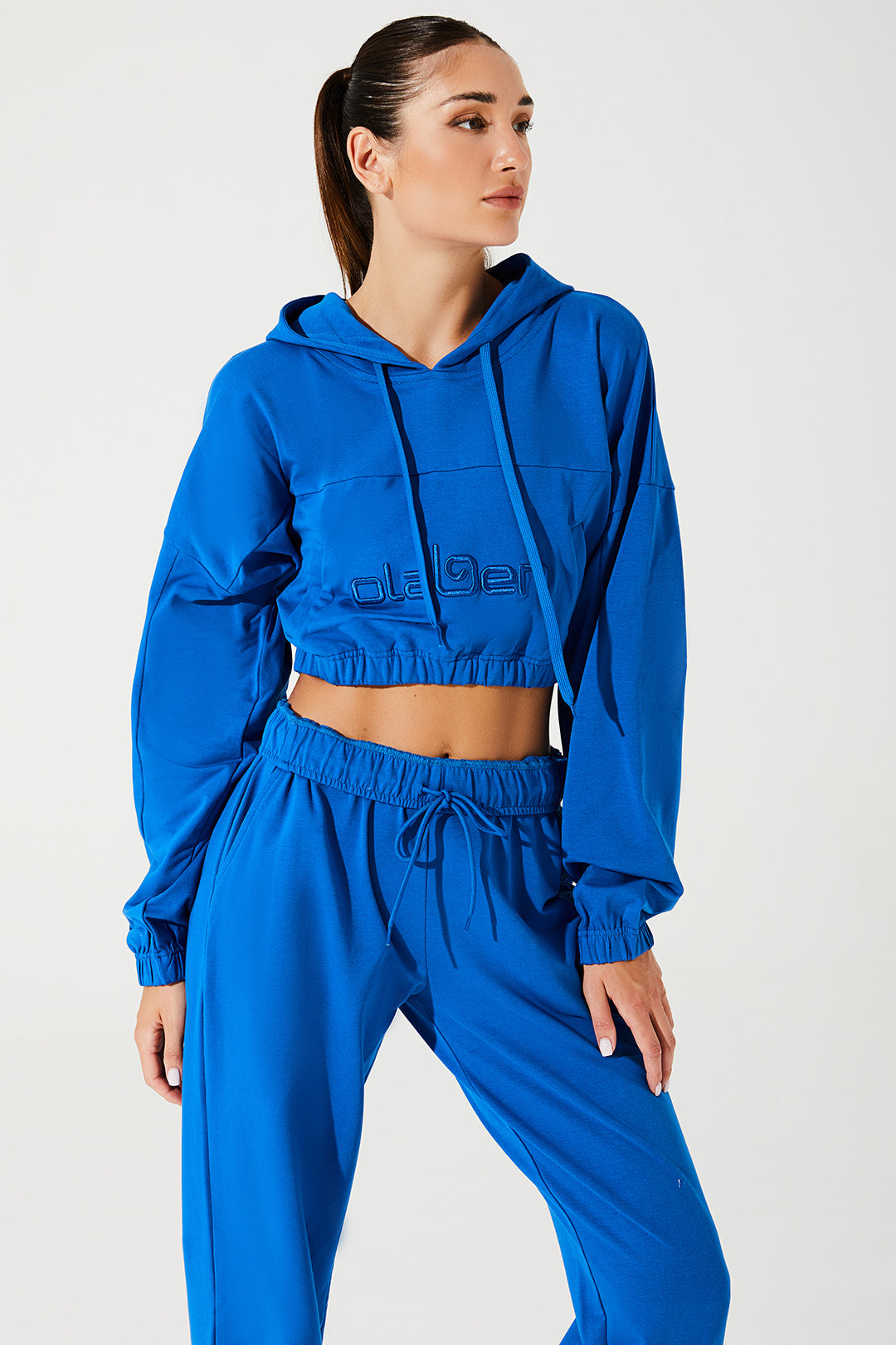 Stylish Atlantis Blue women's hoodie with a cropped design, perfect for casual fashion enthusiasts.