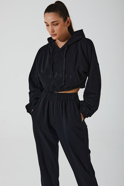 Stylish black women's hoodie with a cropped design, perfect for casual and trendy outfits.