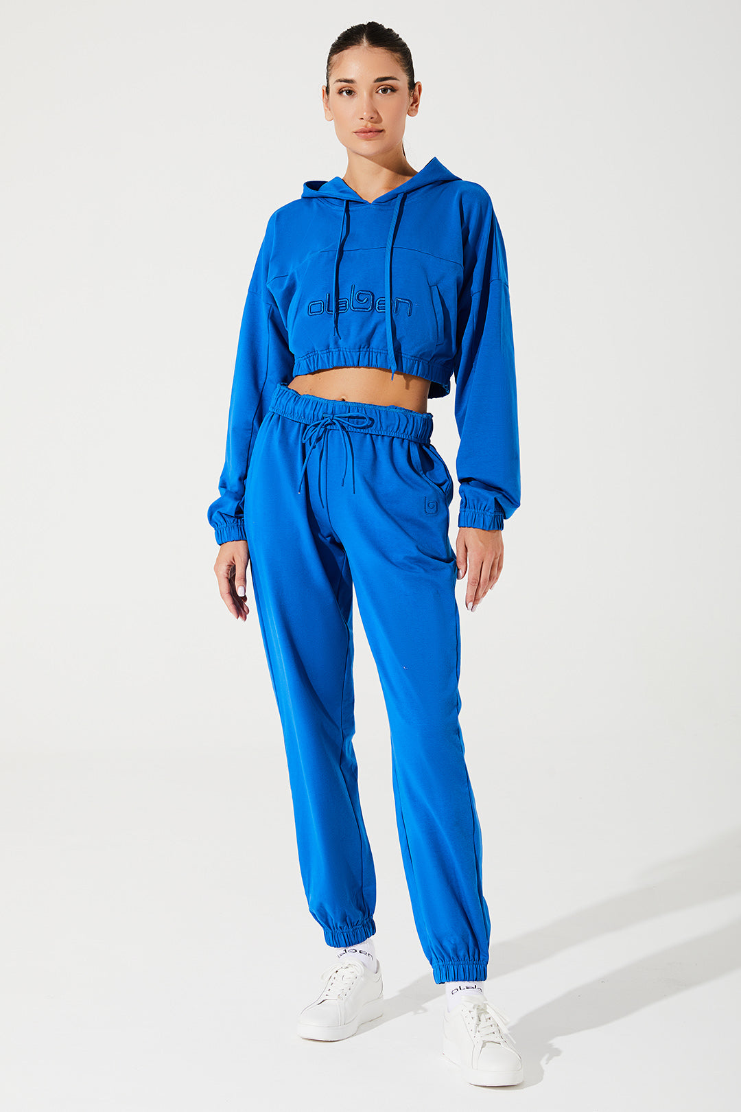Janet wearing Atlantis Blue women's sweatpants, a comfortable and stylish choice for any occasion.