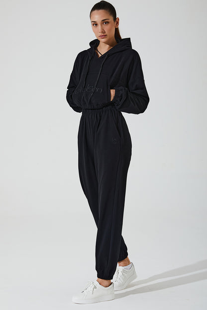 Janet wearing Atlantis Blue women's sweatpants, style OW-0036-WSW-BL, size 7, in a woman's pose.