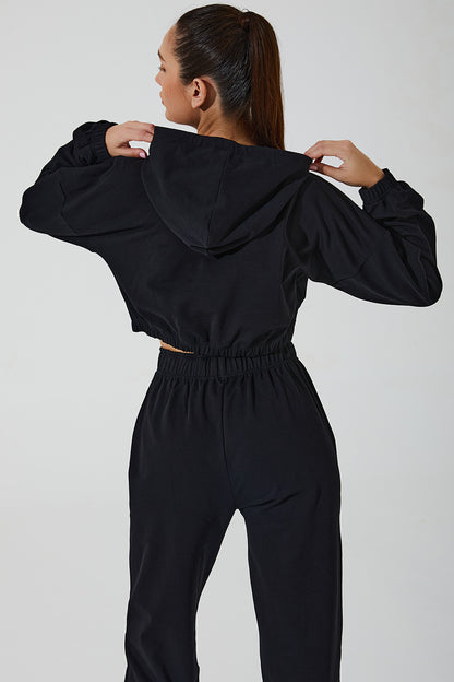 Janet wearing black women's sweatpants, comfortable and stylish, perfect for casual outings or workouts.