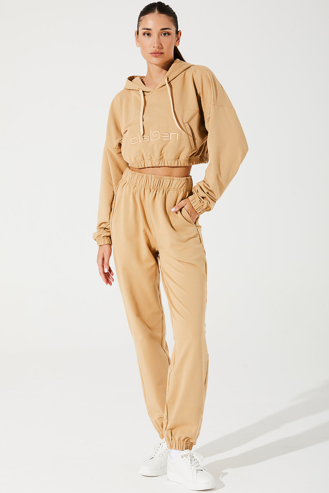 Janet wearing cappuccino beige women's sweatpants, a comfortable and stylish choice for any occasion.